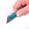 Cúter de seguridad de plástico con cuchilla trapezoidal